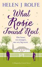 Book cover for What Rosie Found Next by Helen J Rolfe, a book edited by Romance Refined editor Rachel Daven Skinner. A pretty white house is set among trees and gardens while a couple in silhouette stand near each other.